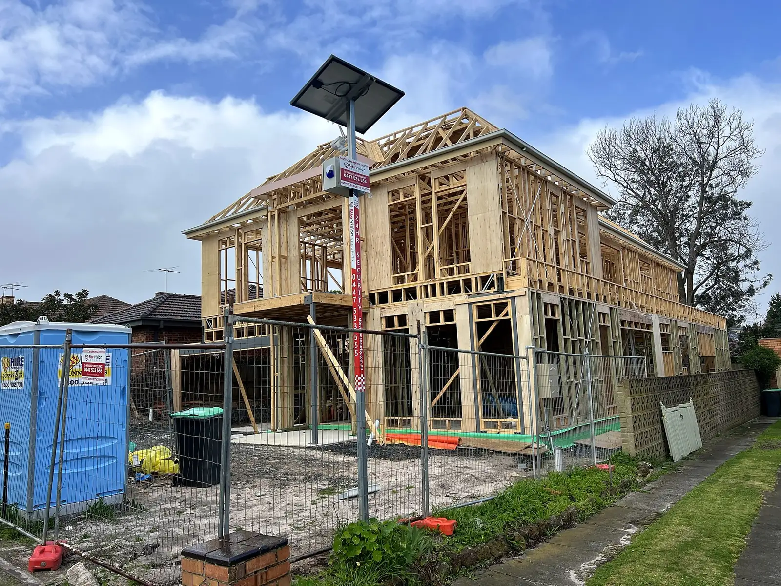 Site Vision Cam solar site camera guarding a frame-stage home build in Melbourne